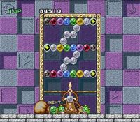 une photo d'Ã©cran de Puzzle Bobble - Bust a Move sur Nintendo Super Nes